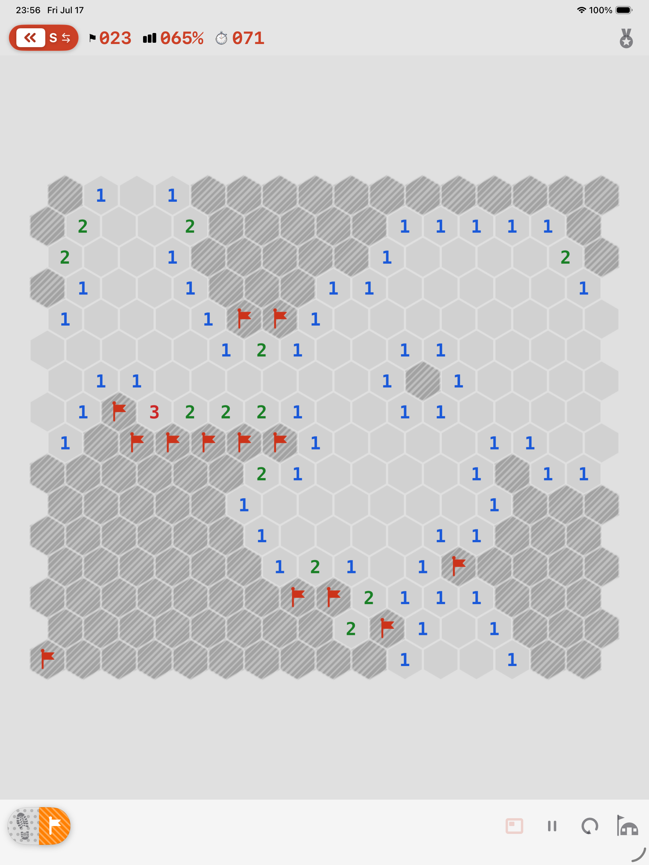 A hex board mid-solve — the Hive family, six neighbours instead of eight.